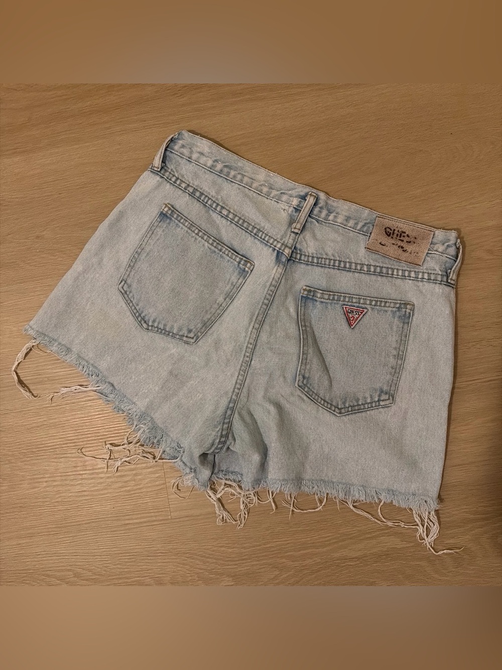 Vintage Guess Light Blue Distressed Denim Shorts with Triangle Logo
